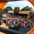 Students interact with each other and vendors on College Avenue in downtown Clemson
