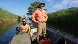 Clemson students Caleb Yon (left) and Reade Ward conduct research at Hobcaw Barony in Georgetown, S.C., to learn how the region's coastal landscapes and communities have adapted to centuries of natural and human-driven change.