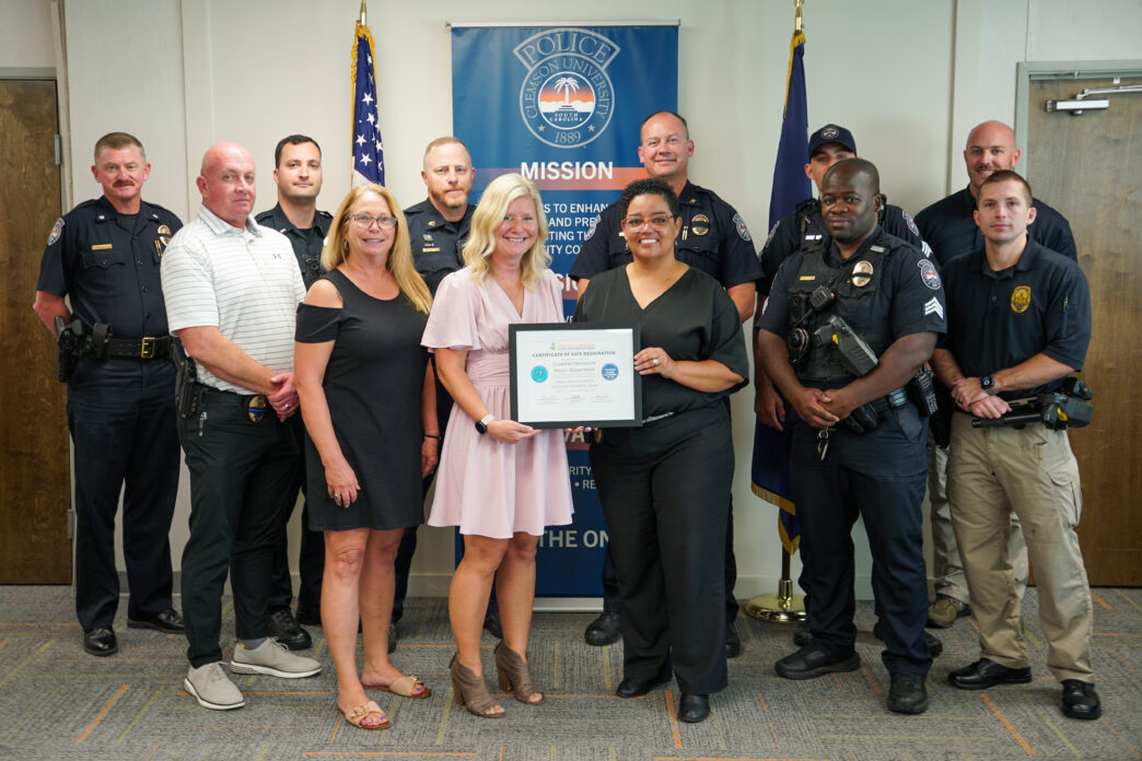 Members of CUPD pose with representatives from the South Carolina Victim's Assistance Network.