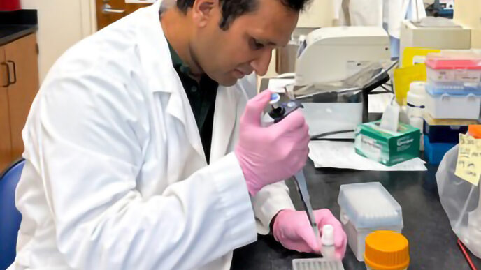 Rahul Kumar, a scientist at the Clemson Coastal Research and Education Center, extracts DNA from watermelon samples for analysis.